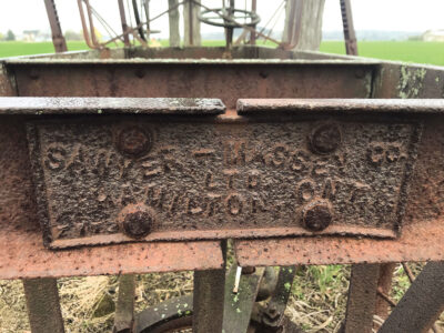 A brown tag on a machine